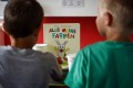 En août dernier, une centaine de Vallonniers ont intégré des classes bilingues, où la moitié des leçons est dispensée en allemand. ARCHIVES CHRISTIAN GALLEY